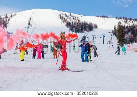 Sheregesh, Kemerovo Region, Russia - April 12, 2019: Young Happy Pretty Woman Dressed In Carnival Co