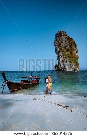 Couple On The Beach, Koh Poda Thailand, The Beautiful Landscape Of Koh Poda Or Poda Island In Krabi 