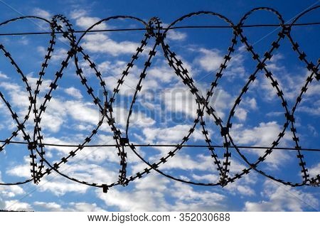 Barbed Wire Against The Sky. Deprivation Of Liberty. Court Sentence. Guarded Area. Imprisonment. Arr