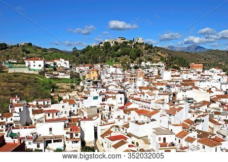 General View Of The Town With Monda Castle Hotel On The Hilltop, Monda, Spain, Malaga Province, Anda