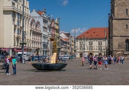 Pilsen, Czech Republic - May 26, 2018: Fountain In The Main Square Of Plzen, Pilsen With Tourists An