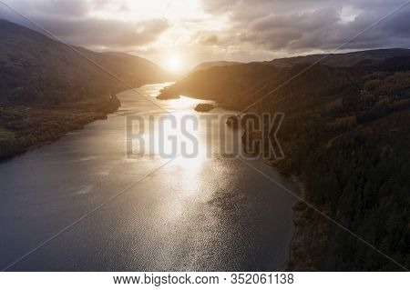Beautiful Aerial Drone Landscape Image Of Glorious Autumn Fall Sun Over Thirlmere In Lake District