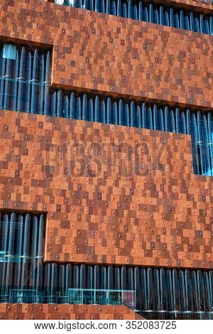 ANTWERP, BELGIUM - MAY 26, 2018: Museum aan de Stroom MAS is a museum located along the river Scheldt designed by Neutelings Riedijk Architects an example of postmodern Art Deco architecture