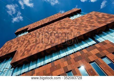 ANTWERP, BELGIUM - MAY 26, 2018: Museum aan de Stroom MAS is a museum located along the river Scheldt designed by Neutelings Riedijk Architects an example of postmodern Art Deco architecture