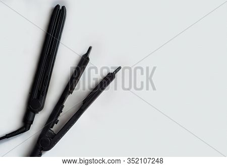Electric Curling Iron On White Background.top View