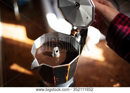 Close-up Of Coffee Moka With Sunlight And Shadows.