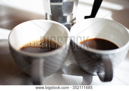 Close-up Of Coffee Moka With Sunlight And Shadows.