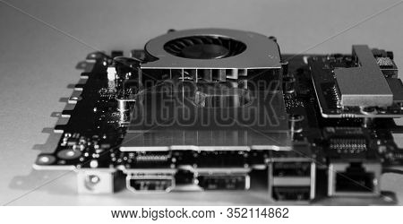 Fan Fins Of A Cooling Fan On Motherboard In Black And White