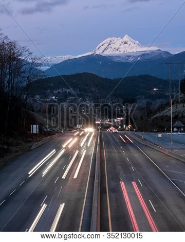 Cars Travelling On A Mountain Highway During Blue Hour