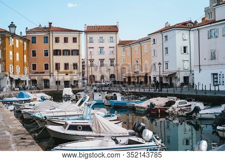 Muggia, Italy - January 15 2015: The Old Harbour Of Muggia, A Coastal Town In Northern Italy With Mo