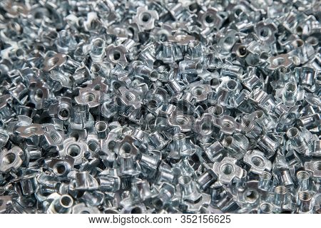 Furniture Nut Persistent M6 Galvanized White In Bulk Closeup In The Studio
