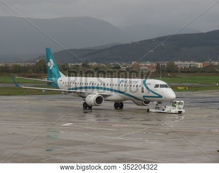 Florence, Italy - Circa November 2019: Airdolomiti Embraer Erj-195lr During Taxi At Peretola Airport
