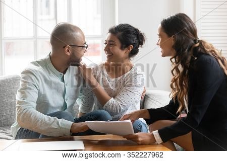 Multi-ethnic Couple Feels Satisfied With Negotiations Results With Agent