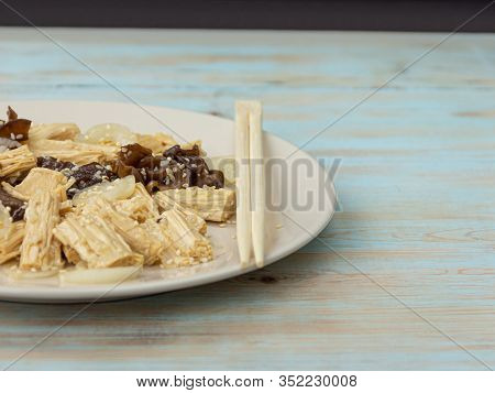 Spicy Chinese Or Korean Yuba Tofu Bamboo And Oyster Mushrooms On Wooden Background.