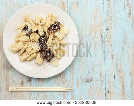 Spicy Chinese Or Korean Yuba Tofu Bamboo And Oyster Mushrooms On Wooden Background.