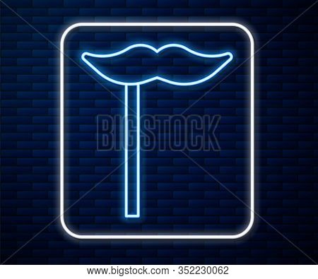 Glowing Neon Line Paper Mustache On Stick Icon Isolated On Brick Wall Background. Concept With Cardb