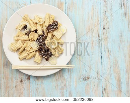 Spicy Chinese Or Korean Yuba Tofu Bamboo And Oyster Mushrooms On Wooden Background.