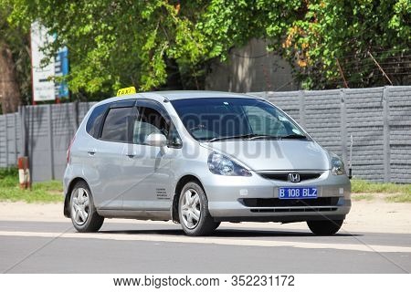 Maun, Botswana - February 9, 2020: Grey Taxi Car Honda Fit In The Town Street.