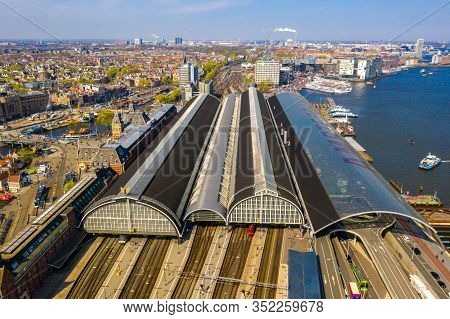 Aerial View Of The Central Train Station In Amsterdam Which Is The Oldest Station In The Netherlands