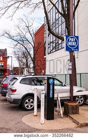 Pittsburgh, Pennsylvania, Usa 2/23/20 A Pay Here Sign In Above A City Of Pittsburgh Parking Authorit