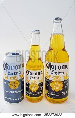 Calgary, Alberta, Canada. Feb 23 2020. A Corona Beer Can 473ml, A Bottle Of 330ml And Bottle Of 710 