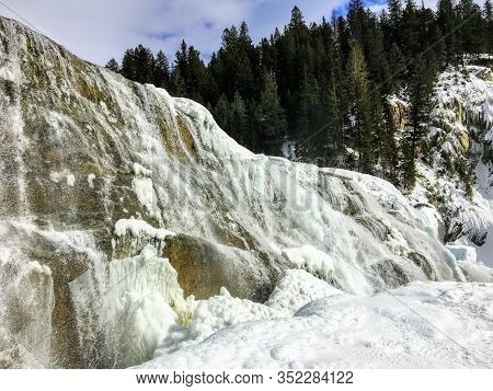 A Beautiful View Of A Frozen Waterfall At Wapta Falls In The Rocky Mountains In The Background, In Y