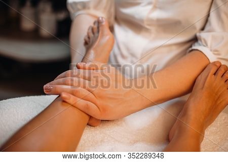 Professional Doctor Is Massaging The Clients Legs Making Her To Relax And Take Pleasure