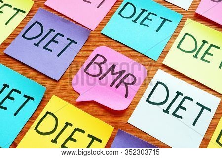 Bmr Basal Metabolic Rate And Diet Signs On The Memo Sticks.