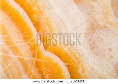Onice Background In Light Yellow And White Color As Part Of Your Design. High Quality Texture.