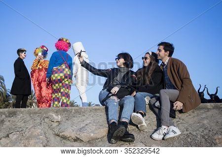 Sitges, Spain - February 23, 2020: People At Last Day Of Sitges Carnival. Burial Carnestoltes - 