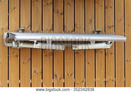 Automatic Electric Canopy Closed At Wall Exterior