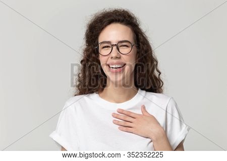 Cheerful Pretty Millennial Woman In Eyeglasses Burst In Laugh.