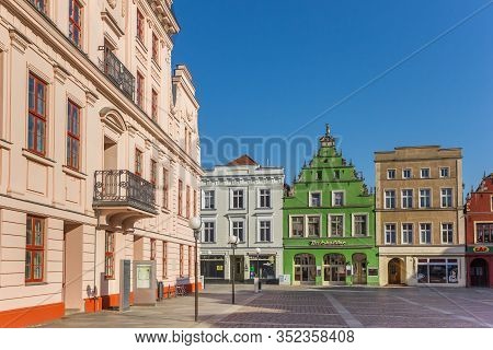 Gustrow, Germany - April 19, 2019: Colorful Historic Buildings On The Central Square Of Gustrow, Ger
