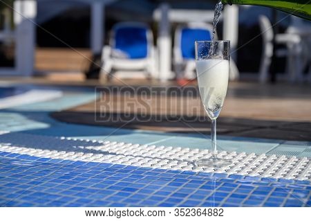 Pool Party With One Glass Of Bubbles White Champagne Or Cava Wine, Romantic Event On All Inclusive H