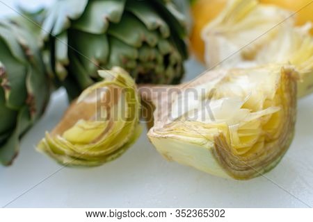 Cooking With Fresh Green Artichokes Heads, Tasty Vegetarian Food