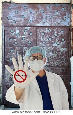  Coronavirus. COVID-19.  Coronavirus Disease 2019. A Doctor holds his hand out with the NO CORONAVIRUS logo. COVID-19 AKA Corona Virus is spreading world wide. COVID-19 is also in the United States. 