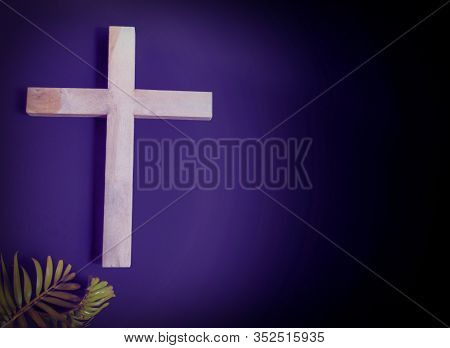Lent Season,holy Week And Good Friday Concepts - Closed Up Wooden Cross In Purple Vintage Background