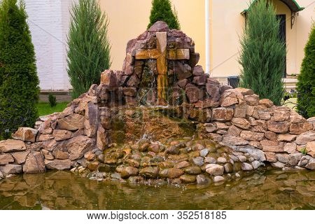 Pond And The Cross Waterfall  In The Nikolo-peshnoshsky Monastery