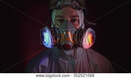 Man In Protective Costume Suit, Gas Protect Medical Spray Paint Mask. Doctor In Respirator. Concept 