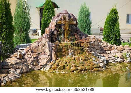 Pond And The Cross Waterfall  In The Nikolo-peshnoshsky Monastery