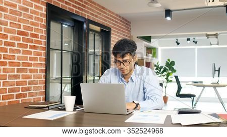 Young Asian Businessman Concentrate On Working With Laptop Computer At Office, Asian Office Man Comt
