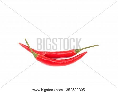 Red Chili Pods Isolated On White Background. Indian Cuisine, Ayurveda, Naturopathy Concept