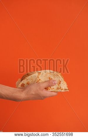 National Food Concept. Mexican National Food Tacos Or Tatar National Food - Kystyby In Hand On An Or