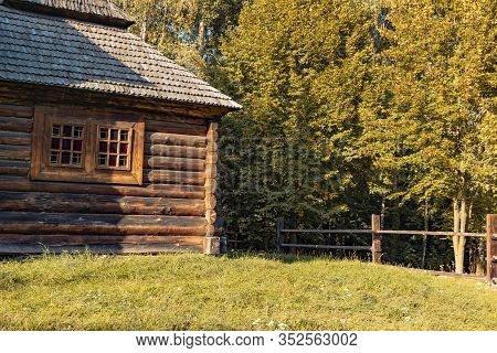 Ukraine Rural Architecture Rustic Wooden House Exterior Building Porch On Green Hill Of Forest Edge 