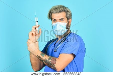 Physician Or Nurse Giving Vaccine Against Virus. Coronavirus Epidemic From China. Mature Doctor Use 