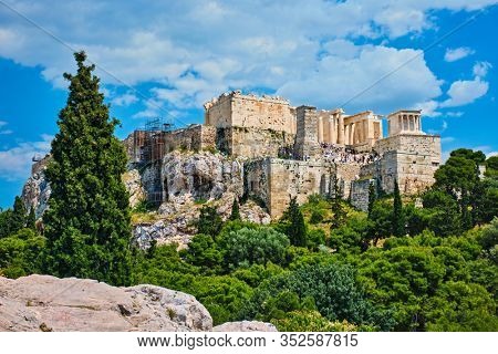 Famous greek tourist landmark - the iconic Parthenon Temple at the Acropolis of Athens as seen from Philopappos Hill, Athens, Greece
