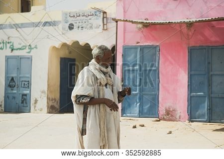 Ferlo Desert, Senegal, January 17, 2020: Unidentified Fulani Man Walks Along The Street. Fulanis Are