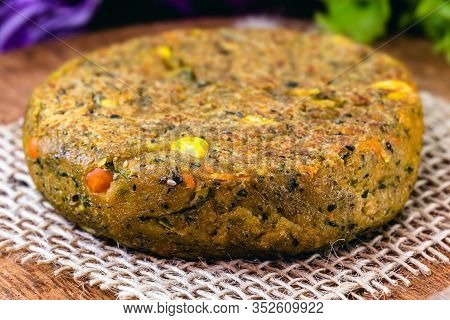 Closeup Of Roasted Vegan Burger, Dessert Or Meatless Snack. Home Made With Vegetables, Chickpeas, So