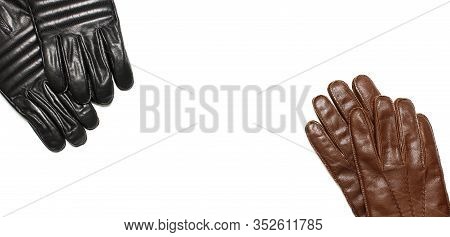 Black And Brown Classic Leather Mens Gloves On White Isolated Background Top View. Stylish Fashionab