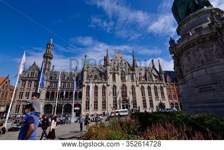 Bruges, Belgium. August 2019. The Market Square Is One Of The Main Squares In The Historic Center: T